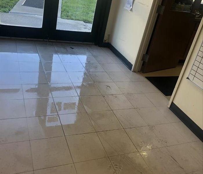 Wet and dirty floor in a small commercial building