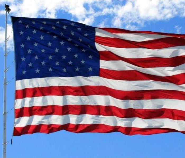 A waving American a flag