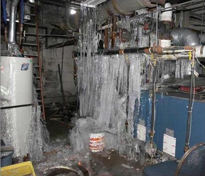 A large amount of frozen pipes in an unfinished basement